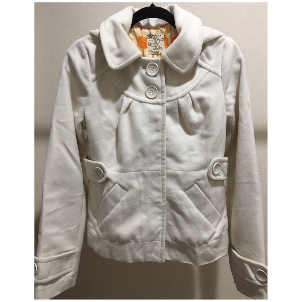 Cream colored hip length pea coat